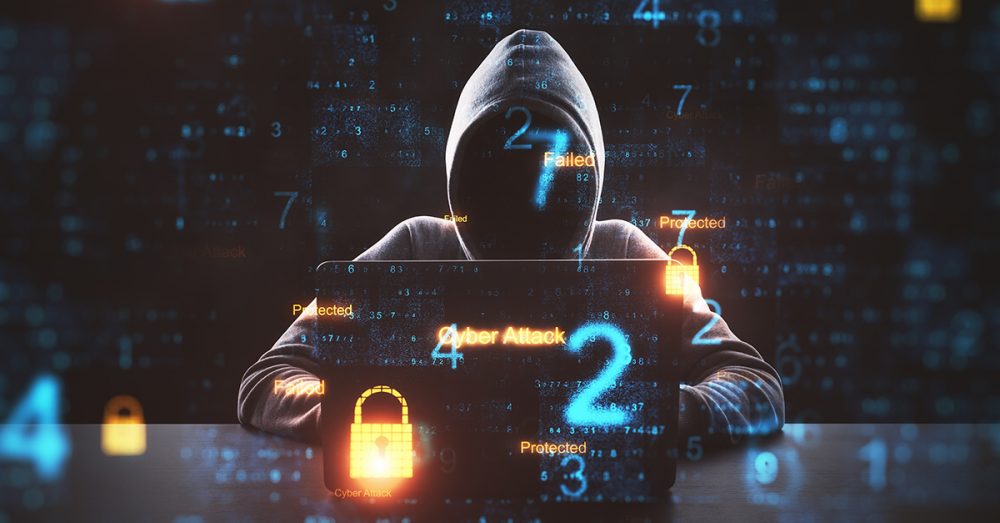 Hacker incappucciato che tenta un cyber attacco: simbolo delle minacce informatiche e della necessità di sicurezza Zero Trust